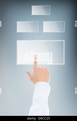 finger pushing keypad button Stock Photo