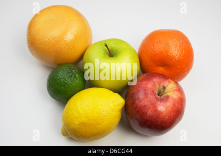 Mixed fruit in its whole form.  Grapefruit,apples,lemon,lime,orange. Stock Photo