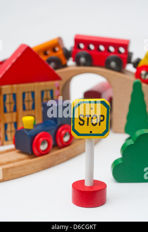 Wooden toy train set with stop sign Stock Photo
