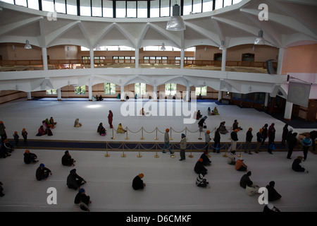 Pray hall Interior  of The Gurdwara Sri Guru Singh Sabha Southall Stock Photo