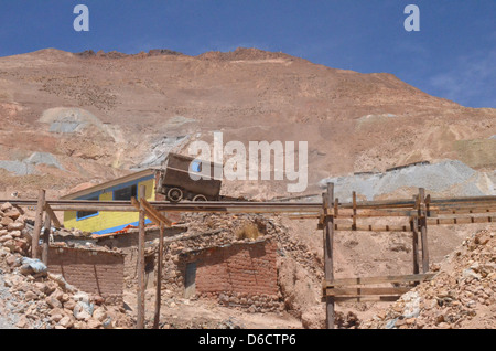 Mine cart on a rail outside the Cerro Rico mines in Potosi, Bolivia Stock Photo