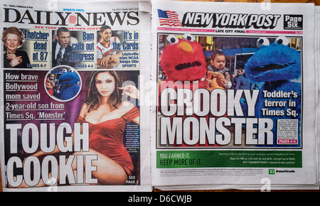 Front pages report on an altercation with one of the costumed characters in Times Square Stock Photo