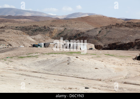 Bedouin tent in Jordan, a dry place of living for a nomadic people Stock Photo