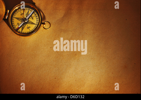 old-fashioned magnetic compass over white background Stock Photo - Alamy