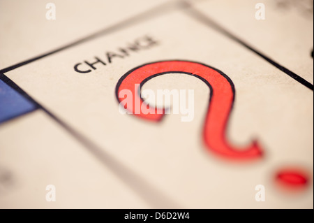 A question mark picture of the board game Monopoly landing on chance. Stock Photo