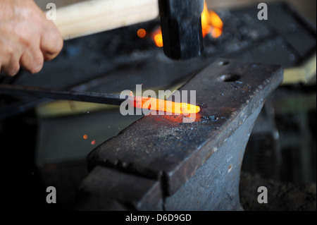 Making a decorative pattern on the anvil Stock Photo - Alamy