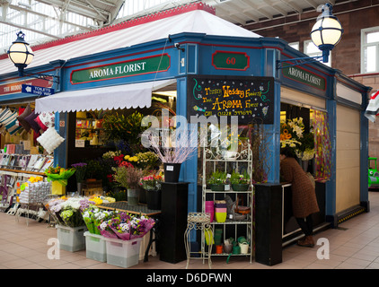 Aroma Florist, Indoor market stall, a Flower shop in Carlisle market hall, Cumbria, UK Stock Photo