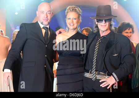 Singer Der Graf (L-R), TV presenter Barbara Schoeneberger and singer Udo Lindenberg pose on stage after the German Radio Award in Hamburg, Germany, 06 September 2012. Germany's greatest radio boradcasters are awarded in twelve categories at the German Radio Award. Photo: Malte Christians Stock Photo