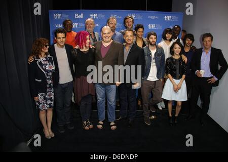 US actress Susan Sarandon (L-R), German director Tom Tykwer, US actor Keith David, US director Lana Wachowski, British actor Jim Broadbent, US director Andy Wachowski, US actors Hugo Weaving, Tom Hanks, James D'Arcy, Halle Berry, Jim Sturgess, Doona Bae, David Gyasi, Zhou Xun, Ben Whishaw and Hugh Grant attend a press conference for the film 'Cloud Atlas' during the 37th annual Tor Stock Photo