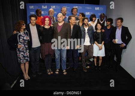 US actress Susan Sarandon (L-R), German director Tom Tykwer, US actor Keith David, US director Lana Wachowski, British actor Jim Broadbent, US director Andy Wachowski, US actors Hugo Weaving, Tom Hanks, James D'Arcy, Halle Berry, Jim Sturgess, Doona Bae, David Gyasi, Zhou Xun, Ben Whishaw and Hugh Grant attend a press conference for the film 'Cloud Atlas' during the 37th annual Tor Stock Photo