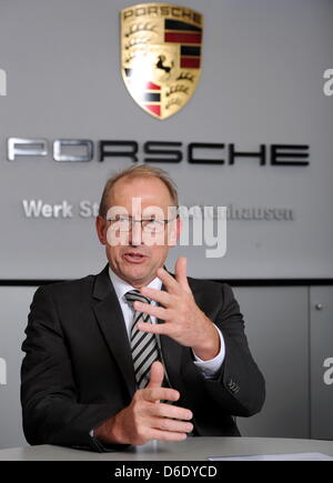 Wolfgang Leimgruber, Executive Vice President Production and Logistics Porsche AG, answers journalists' questions in an interview with German news agency dpa at the company headquarters in Stuttgart-Zuffenhausen, Germany, 13 September 2012. In 2018, Porsche hopes to sell double the number of cars it has in 2011. Photo: Bernd Weissbrod Stock Photo