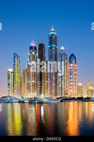 Evening view of skyline with apartment building skyscrapers at Marina district in New Dubai in United Arab Emirates Stock Photo