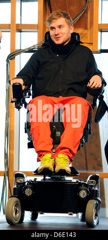 Samuel Koch is seen during a church service at the Wale Pavillon on the former Expo area in Hanover, Germany, 15 January 2012. 24 year old Koch talked about how his life changed after his accident during the ZDF television show 'Wetten, dass...?' in December 2010. Koch somersaulted over driving cars with coil springs, fell and has been paralysed from the neck downward since. Photo: Stock Photo