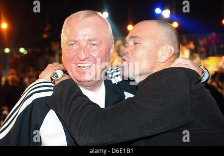 Former boxer Sven Ottke (R) greets boxing coach Ulli Wegner before the WBO Europe super-middleweight Championship fight between Abraham and Argetnine boxer Farias at the Baden Arena in Offenburg, Germany, 14 January 2012. Photo: Patrick Seeger Stock Photo