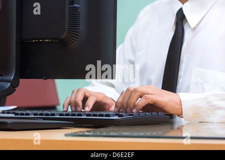 Businessman using computer for working Stock Photo