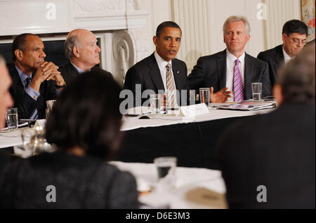 United States President Barack Obama (C) meets with his Council on Jobs and Competitiveness, group of business leaders tapped to come up with job-spurring ideas, including (L-R) American Express Chairman and CEO Kenneth Chenault, White House Chief of Staff William Daley, General Electric CEO Jeffrey Imelt and Office of Management and Budget Director Jacob Lew, in the State Dining R Stock Photo