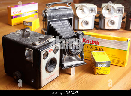Cameras from the post-war period, a Brownie Box and further cameras of the Brownie-series, as well as boxes of films of Kodak are pictured in Koblenz, Germany, 19 January 2012. Photography pioneer Kodak, which dominated film sales for much of the 20th century, has been in talks with banks to file for bankruptcy. According to official statements of Kodak on 19 January 2012, the comp Stock Photo