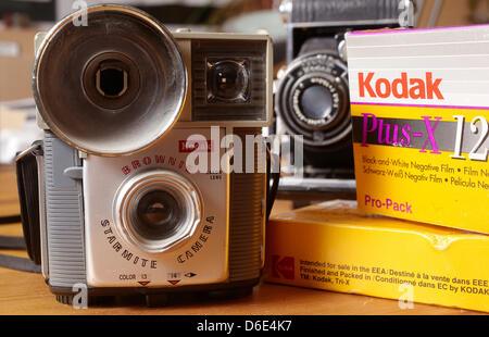 A Brownie Starmite, a folding camera and boxes of films of Kodak are pictured in Koblenz, Germany, 19 January 2012. Photography pioneer Kodak, which dominated film sales for much of the 20th century, has been in talks with banks to file for bankruptcy. According to official statements of Kodak on 19 January 2012, the company intends to continue working during the insolvency proceed Stock Photo