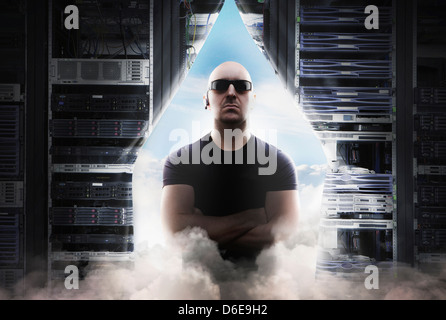 Caucasian man standing in parted curtain and clouds Stock Photo