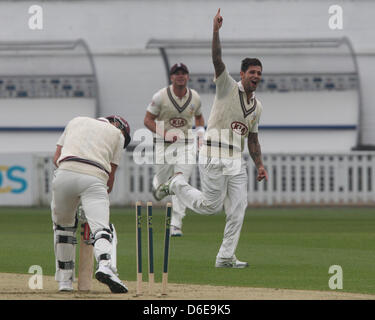 London, UK. 17th April, 2013. Jade Dernbach of Surrey CCC bowls out Nick Compton of Somerset CCC during the LV County Championship Division 1 game between Surrey and  Somerset from the Oval. Stock Photo