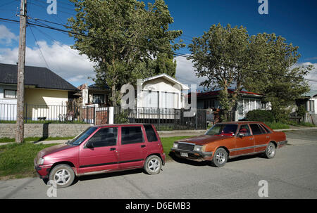 (dpa FILE) - An archive picture, dated 19 November 2008, shows two cars from the 1980s standing in a street in the town of Puerto Natales, Chile. The town of Puerto Natales with around 20,000 inhabitants is located at the Ultima-Esperanza fjord and is a regular destination for tourists to observe penguines and to visit the local wildlife reserve in the nearby national park. Photo:  Stock Photo