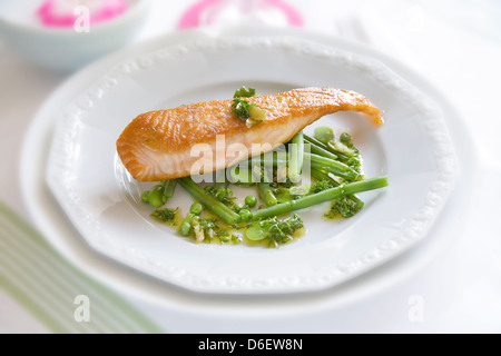 Pan fried Salmon fillet  served on a bed of mixed green beans