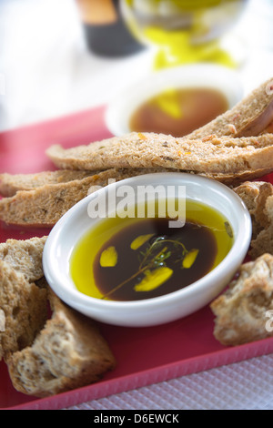 Rustic bread served with extra virgin olive oil and balsamic vinegar Stock Photo