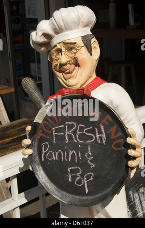Wooden chef doll with fresh sign in the Commercial Drive Italian district in Vancouver, BC, Canada Stock Photo