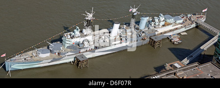 Aerial view from the Shard of warship camouflage on ex Royal Navy HMS Belfast light cruiser part of Imperial War Museum on River Thames London UK Stock Photo