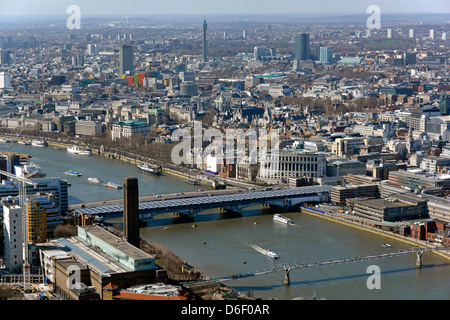 London cityscape skyline over and beyond River Thames looking towards the West End with Wembley stadium distant Stock Photo