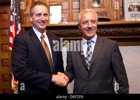 Saxony's Premier Stanislaw Tillich (CDU, R) and vice-governour of the US state New York, Robert J. Duffy, shake hands during a meeting in Duffy's office in the State Capitol building in Albany, USA, 17 April 2013. Tillich will visit the USA from 14 till 20 April 2013 and later Canada, accompanied by an economic delegation. Photo: Arno Burgi Stock Photo