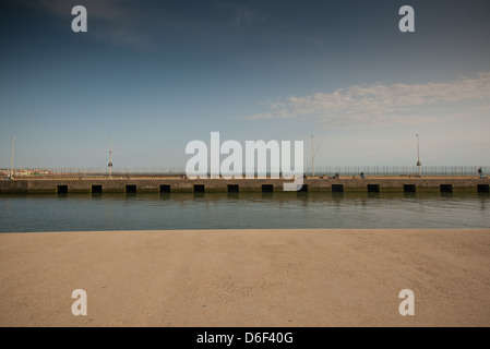 quay and canal of Tiber river in Fiumicino Rome, Stock Photo