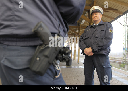 Flensburg, Germany, the federal police at a control in the train of Deutsche Bahn Stock Photo