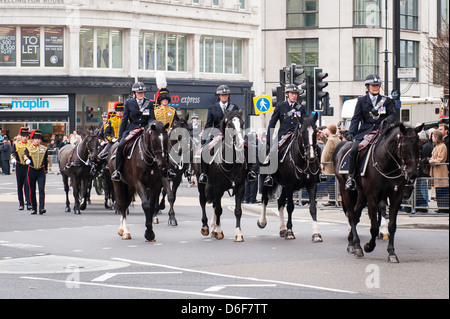 London Aldwych Strand Baroness Margaret Maggie Thatcher funeral cortege parade King's Troop Royal Horse Artillery Police Stock Photo