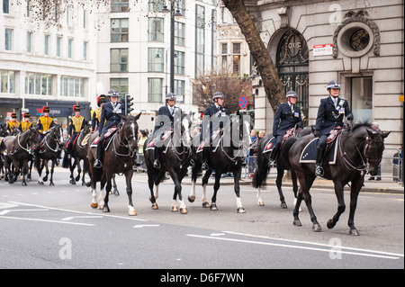 London Aldwych Strand Baroness Margaret Maggie Thatcher funeral cortege parade King's Troop Royal Horse Artillery Police Stock Photo