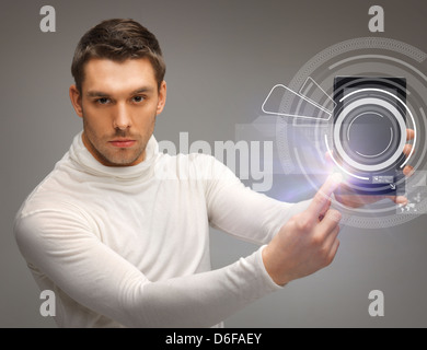 man with virtual tablet pc Stock Photo