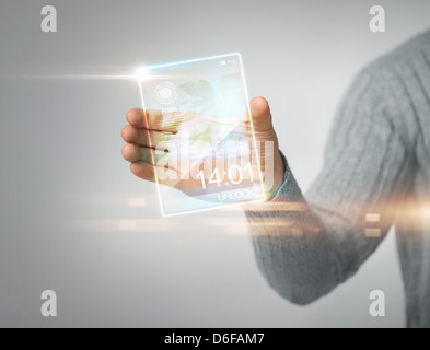man holding transparent phone Stock Photo