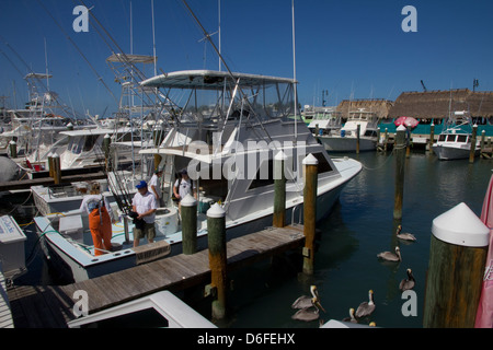 The charter vessel Lo Que Sea is back in her slip at Ft. Pierce Marina following a successful day of offshore fishing. Stock Photo