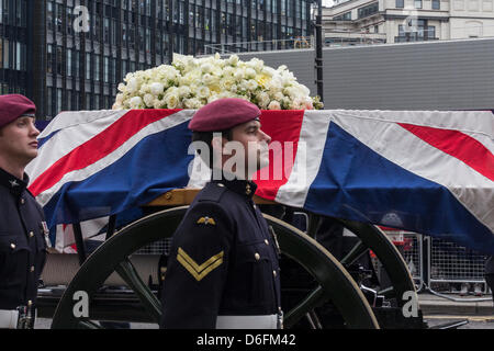 The coffin of Baroness Margaret Thatcher is draped in a Union Flag and carried on a gun carriage to St Paul's Cathedral - London, England, UK Stock Photo