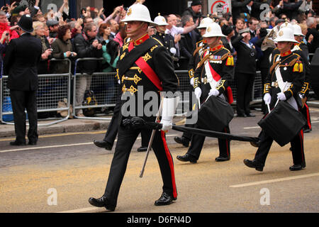 London, UK. 17th April 2013. The Royal Marines band performs at the funeral procession of Margaret Thatcher in London, England. Baroness Thatcher (1925 - 2013) was a stateswoman and the prime minister of the United Kingdom from 1979 to 1991. Credit: whyey Stock Photo