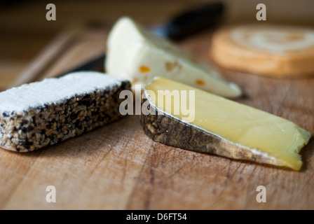 Selection of Cheeses on a cheese board Stock Photo