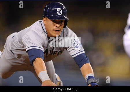 Los Angeles, CA, USA. April 17, 2013.  San Diego Padres shortstop Everth Cabrera (2) dives head first into 3rd base during the Major League Baseball game between the Los Angeles Dodgers and the San Diego Padres at Dodger Stadium in Los Angeles, CA. David Hood/CSM/Alamy Live News Stock Photo