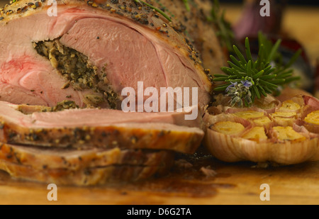 Close up of sliced leg of stuffed lamb Stock Photo