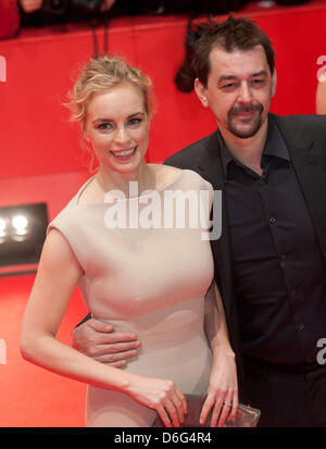 German actress Nina Hoss and her boyfriend Alex Silva arrive for the premiere of the movie 'Farewell, My Queen' ('Les Adieux à la reine') during the 62nd Berlin International Film Festival, in Berlin, Germany, 09 February 2012. The movie has been selected as the Berlinale's opening film and is part of the main competition. The 62nd Berlinale takes place from 09 to 19 February. Phot Stock Photo
