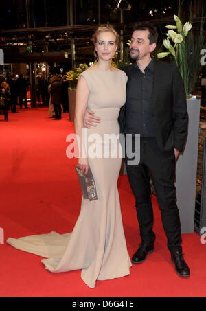 German actress Nina Hoss and her boyfriend Alex Silva arrive for the premiere of the movie 'Farewell, My Queen' ('Les Adieux à la reine') during the 62nd Berlin International Film Festival, in Berlin, Germany, 09 February 2012. The movie has been selected as the Berlinale's opening film and is part of the main competition. The 62nd Berlinale takes place from 09 to 19 February. Phot Stock Photo