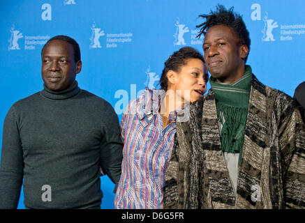 Actor Djolof M bengue (l-r), actress Anisia Uzeyman and actor Saul Williams are posing at a photocall for the movie 'Tey' (Aujourd hui) during the 62nd Berlin International Film Festival, in Berlin, Germany, 10 February 2012. The movie is presented in competition at the 62nd Berlinale running from 09 to 19 February. Photo:Tim Brakemeier dpa/lbn Stock Photo