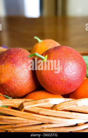 Fresh blood oranges in a basket Stock Photo