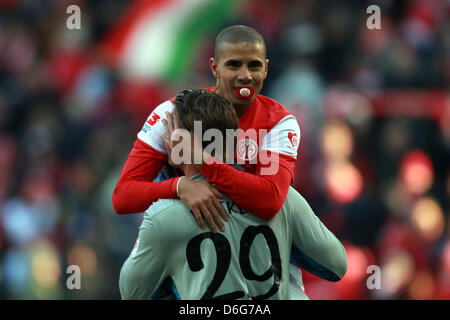 Mainz's Mohamed Zidan celebrates his 1-0 goal with goalkeeper Christian Wetklo during the Bundesliga match between FSV Mainz 05 and Hannover 96 at Coface Arena in Mainz, Germany, 11 February 2012. The game ended 1-1. Photo: FREDRIK VON ERICHSEN (ATTENTION: EMBARGO CONDITIONS! The DFL permits the further utilisation of the pictures in IPTV, mobile Stock Photo