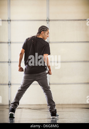 Hispanic dancer practicing in studio Stock Photo