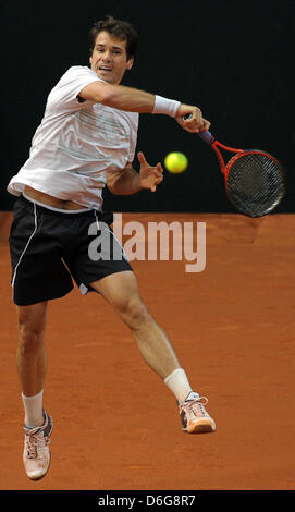 German tennis player Tommy Haas plays the ball during the Davis Cup tennis double's match with teammate Petzschner against Argentina at Stechert Arena in Bamberg, Germany, 11 February 2012. From 10 to 12 February, the Davis Cup first round matches Germany vs Argentina will be played in Bamberg. Photo: David Ebener Stock Photo